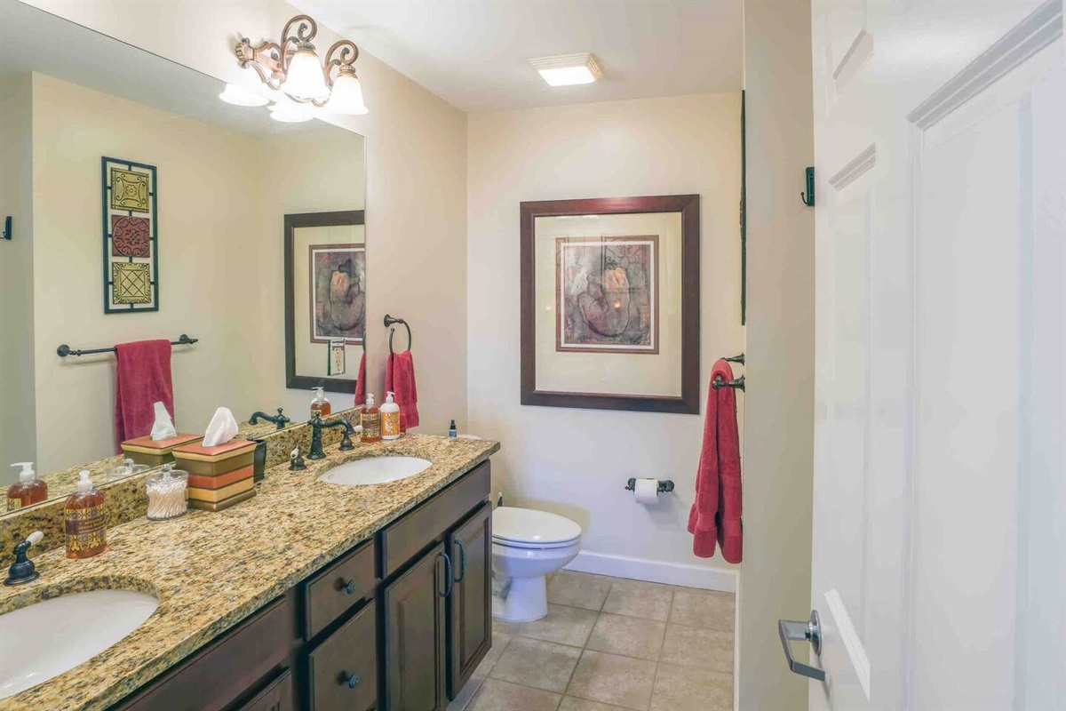 Here's the dual sink bathroom stocked with everything you'll need for your stay with us!