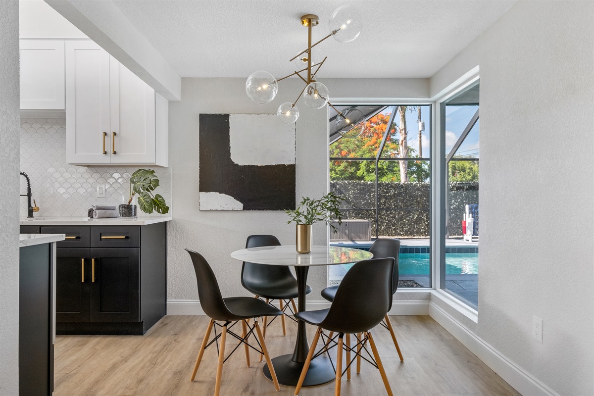 Breakfast nook overlooking the pool with extra large windows