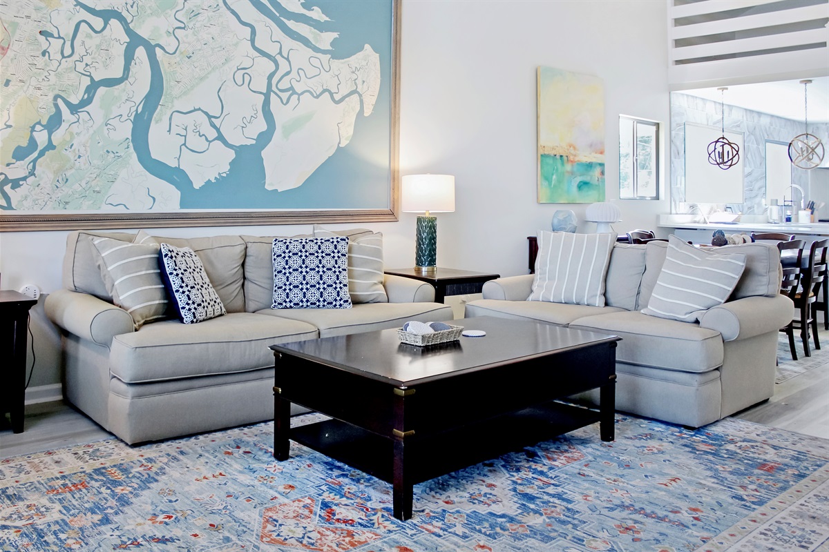 Cozy up in comfort while taking in panoramic marsh views from the living room.