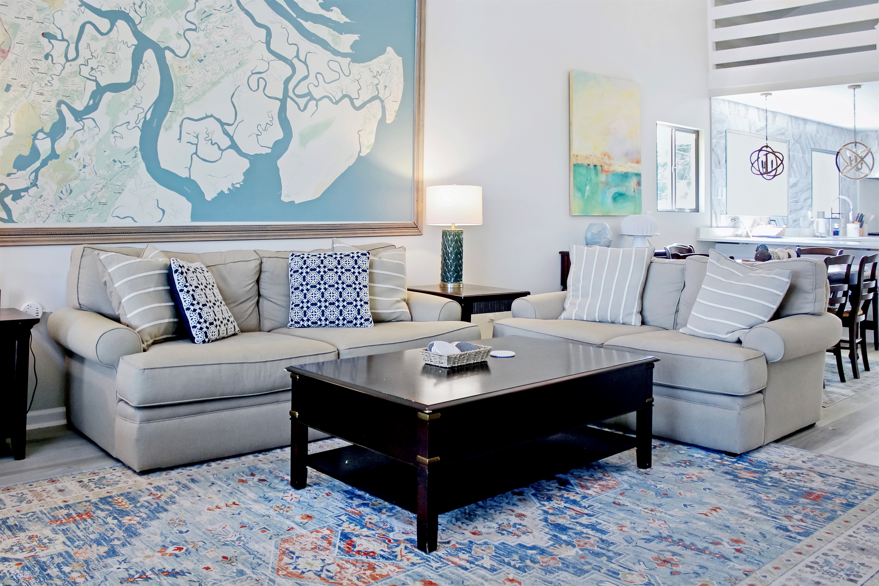 Cozy up in comfort while taking in panoramic marsh views from the living room.