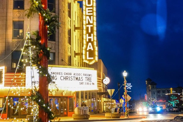 Stroll beneath the glowing lights of downtown Muskegon, where holiday charm fills the crisp winter air