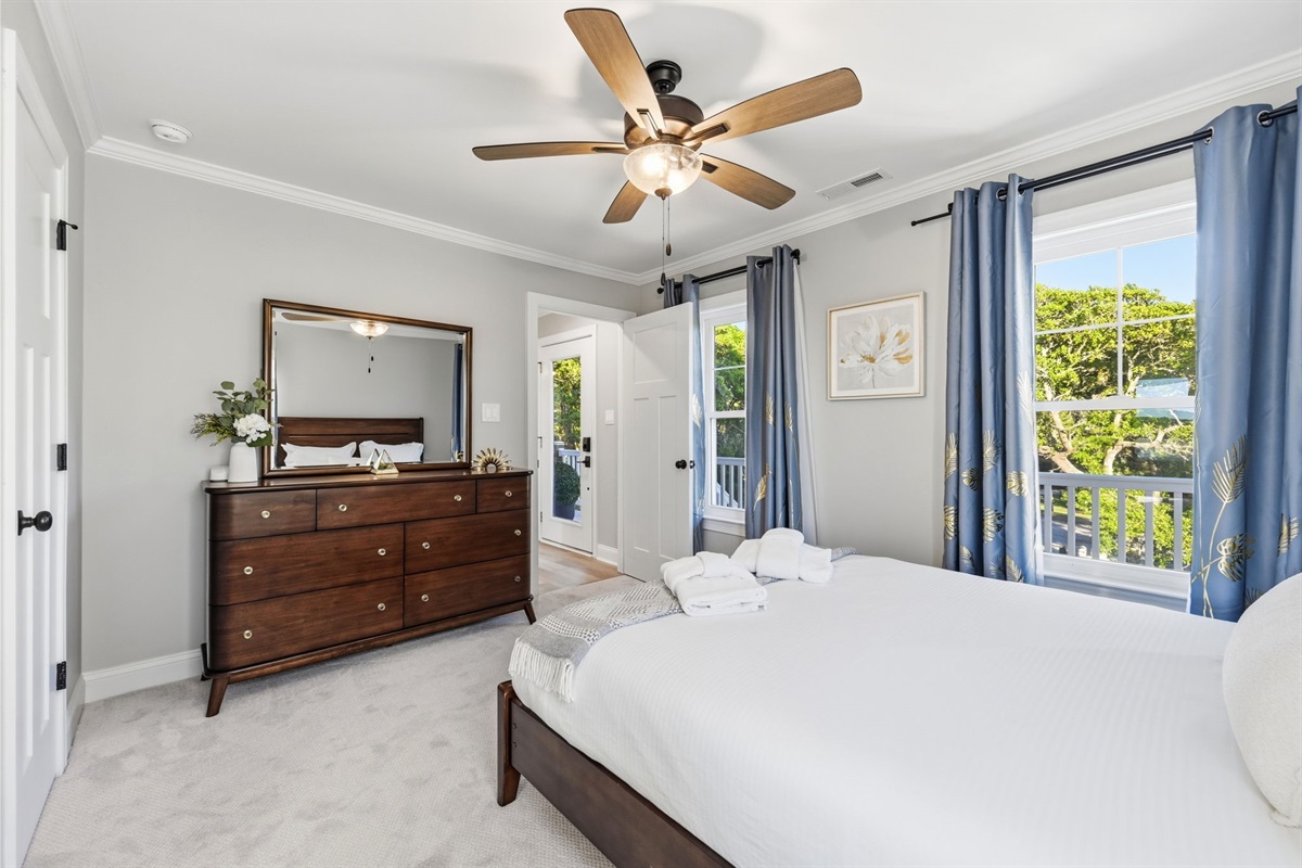 Relax in this bright and spacious retreat featuring plush bedding, Smart TV access, and peaceful natural light throughout