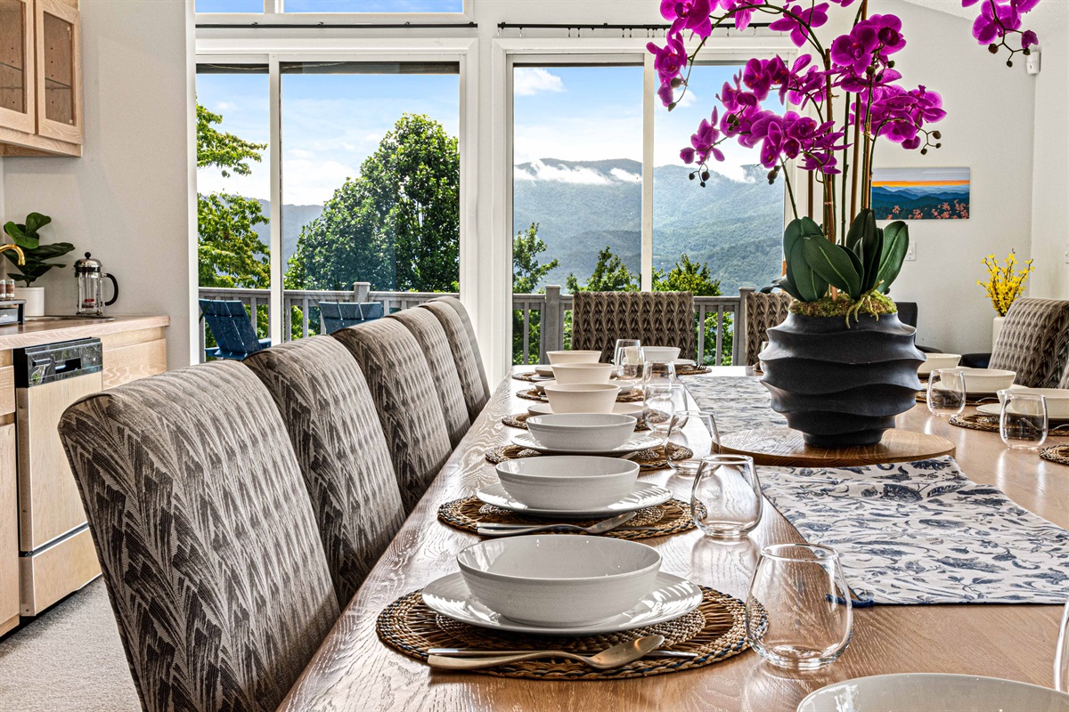 Dining Room: Gather around a stylish table with stunning mountain views and vibrant floral touches!