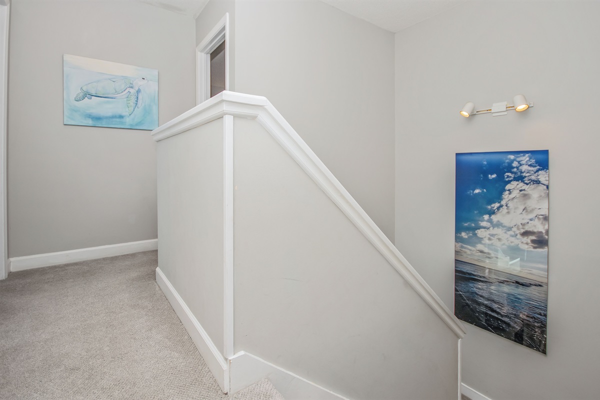 Stairway to 3 Upstairs Bedrooms & 2 Bathrooms