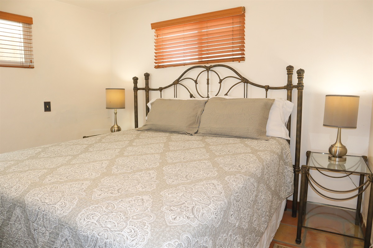 Circa Del Mar - Downstairs Bedroom 6 with a King bed with Wesley Allen headboard and open-toe foot posts.
