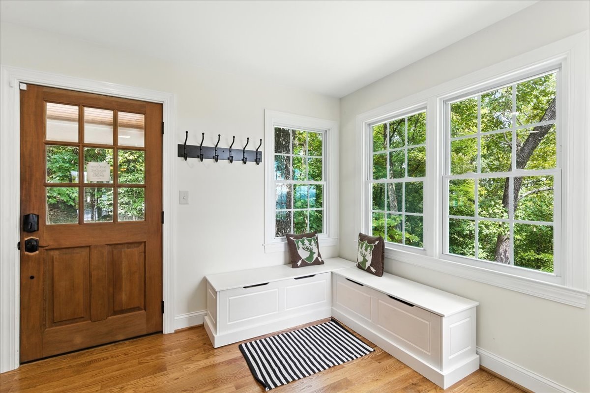 A cozy nook with built-in benches sits in the kitchen corner, perfect for morning coffee or a quiet read.