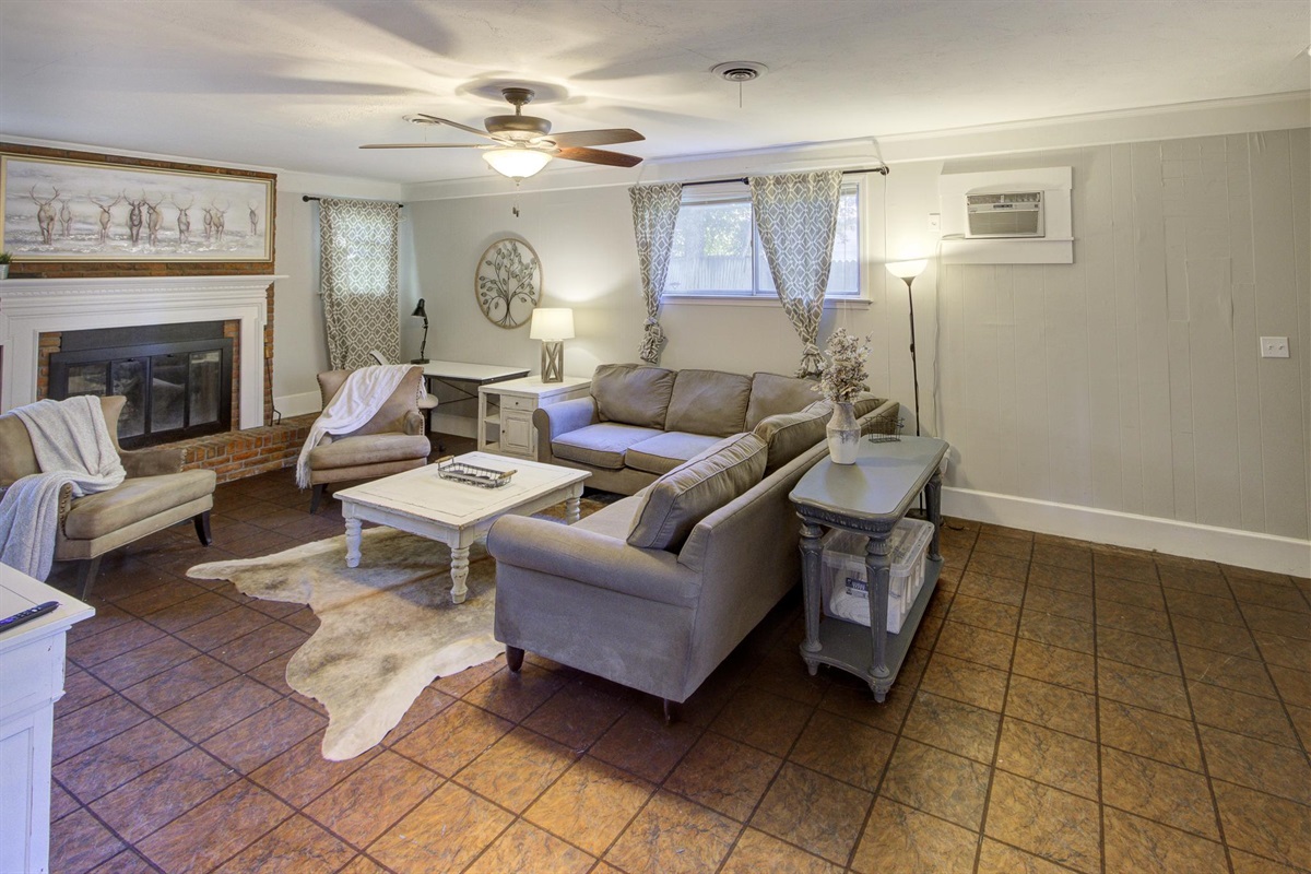 Spacious 2nd living room with desk, TV, and full size pull-out sofa bed