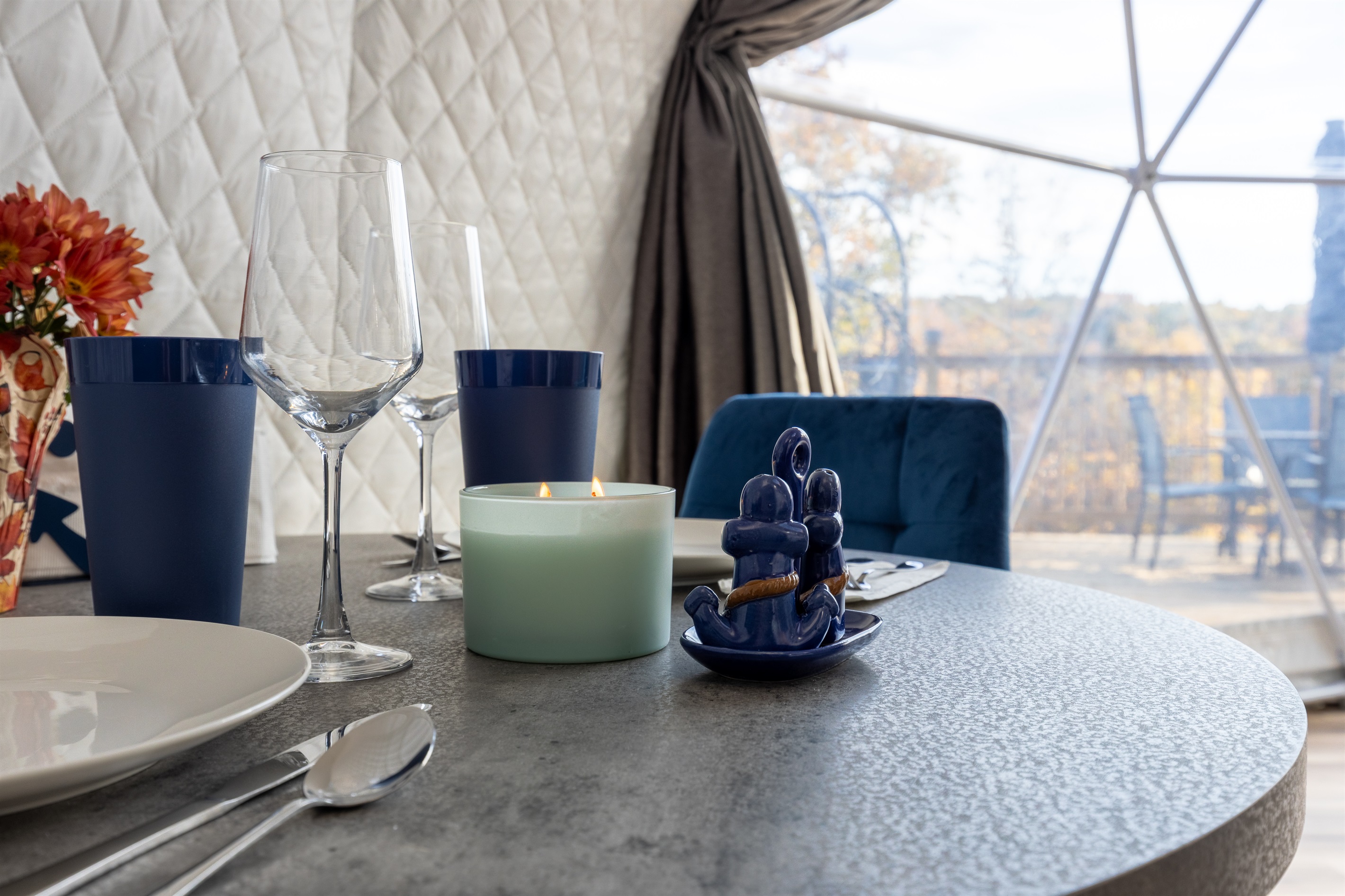 Cozy dining table set for two — perfect for a romantic meal inside your private lakeview dome