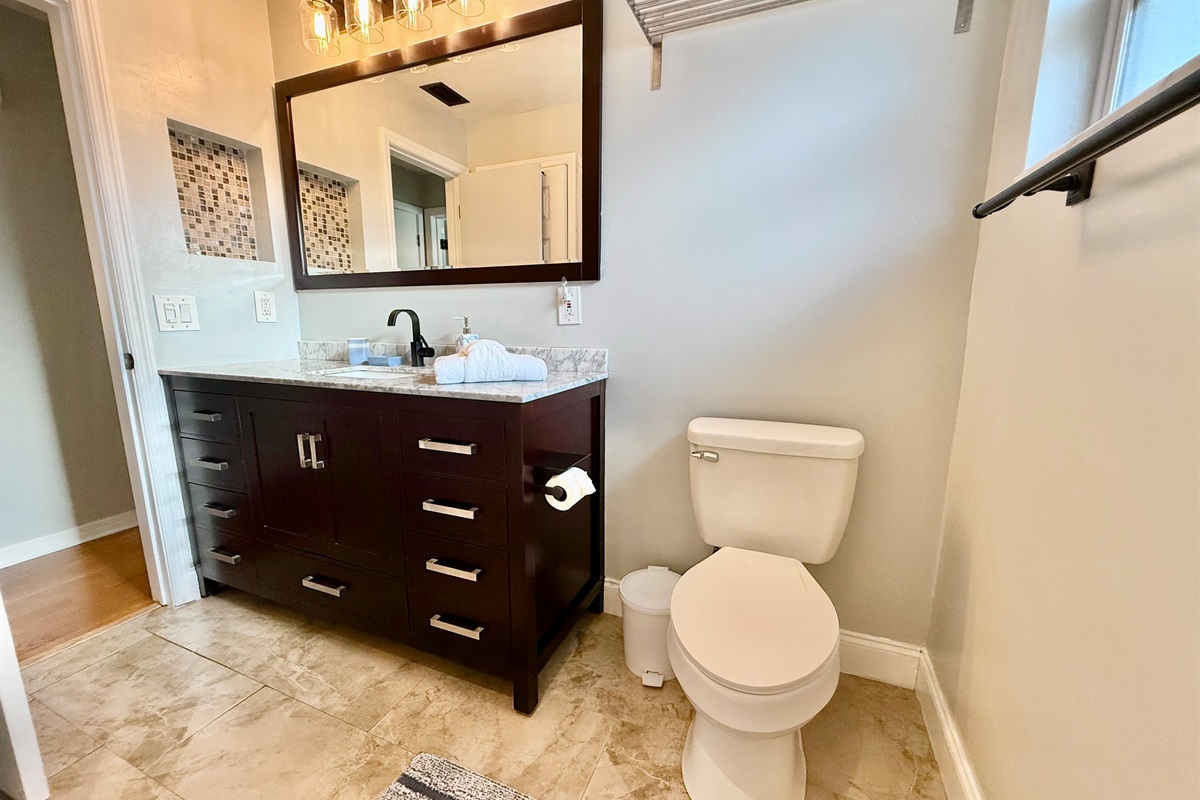 Clean, bright, and comfortable—this full bath offers plenty of counter space, and a peaceful atmosphere.