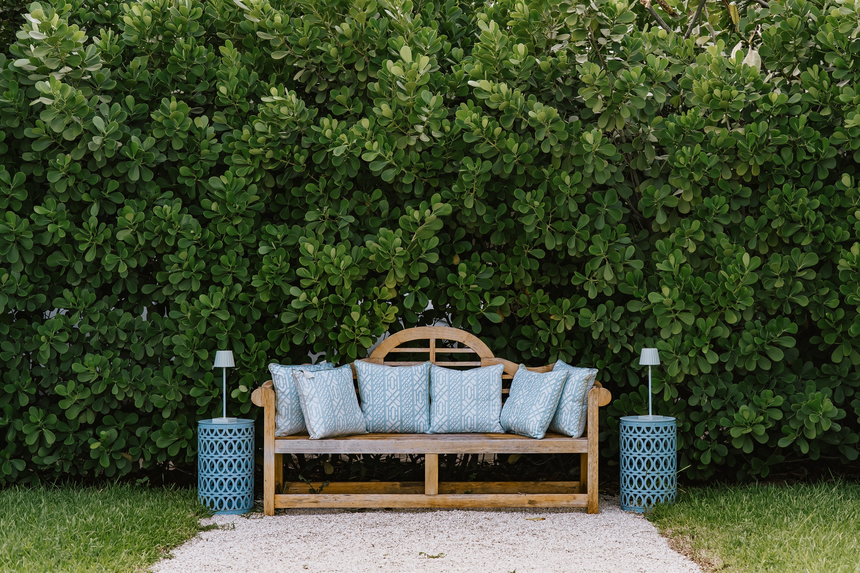 The garden of The Marisol features a spacious lawn, a walking path, hand-selected plantings and cozy, relaxing seating areas to take in the full beauty of the grounds.