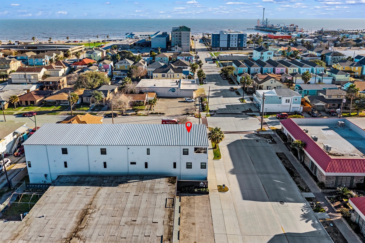 Exterior View: Discover coastal charm with stunning ocean views and vibrant Galveston streets within walking distance to the beach and pleasure pier!