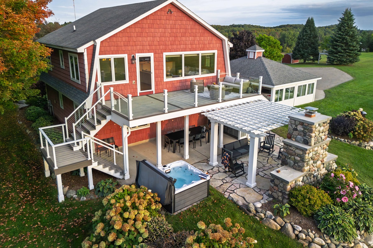 Set on 6 acres, you have plenty of room for hot tubbing, playing a game of cornhole, or joining your 4 year old and rolling down the hill!