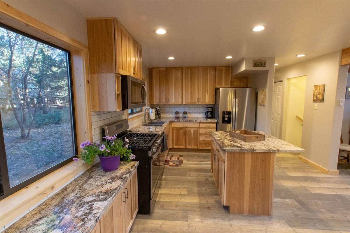 WOW, even more kitchen with granite counter tops