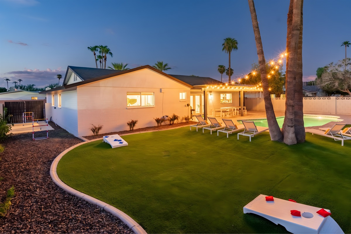 Play cornhole or ladder ball while the kids or dogs run in the large grassy yard