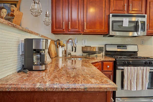 Marble countertops and stainless steel appliances