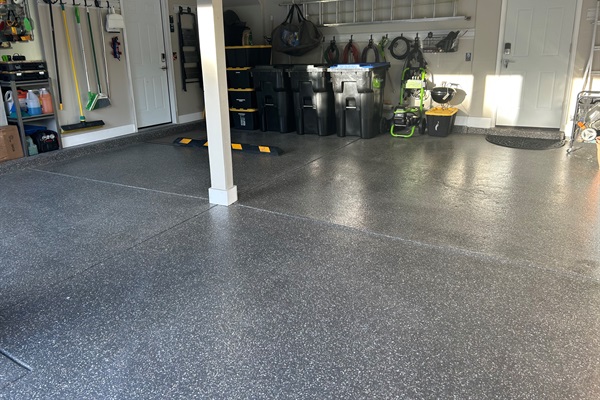 Clean sweep — 2-car garage with EV charger + 3 driveway spots