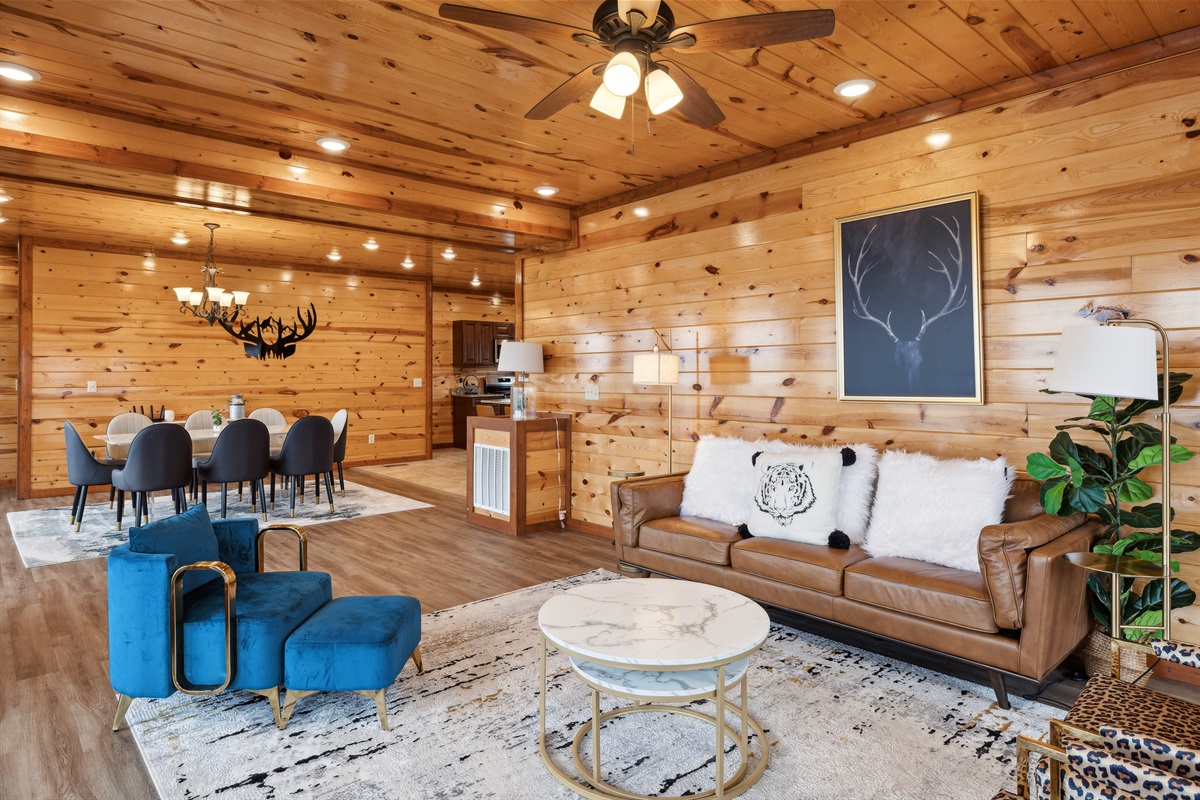 Main level living area featuring a fireplace and TV