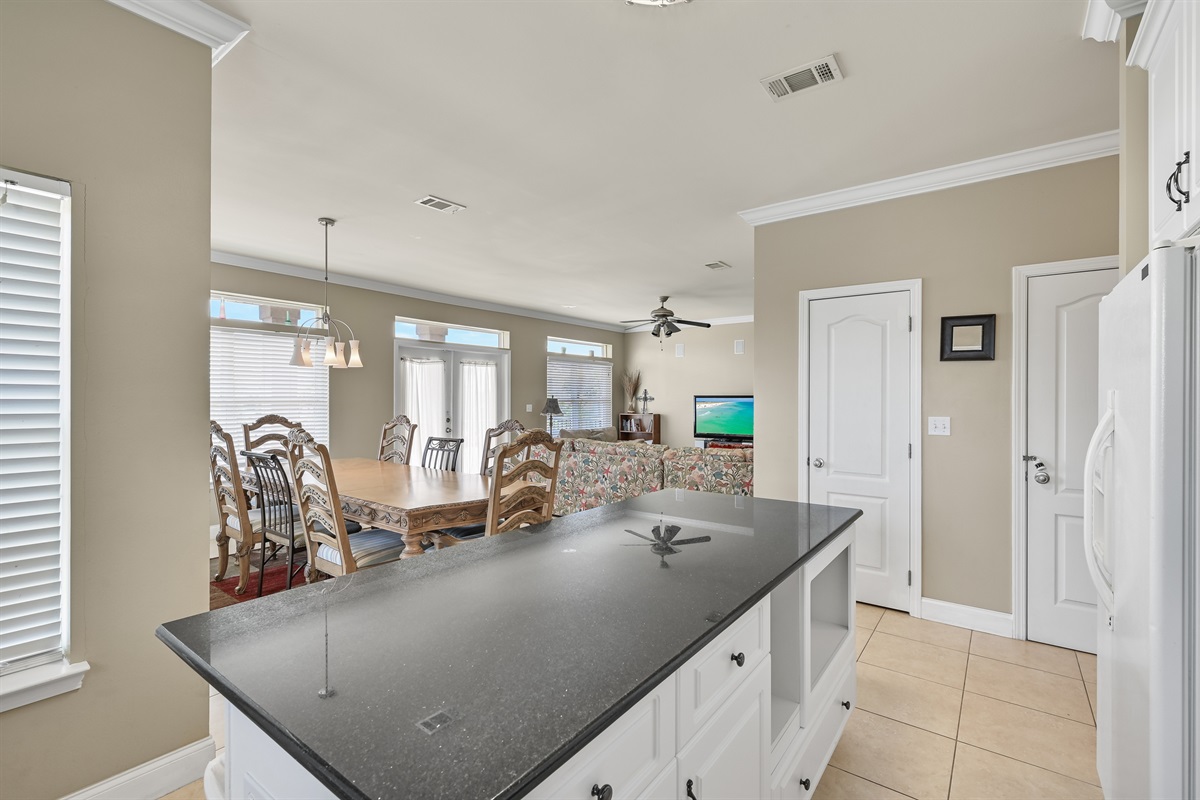 Full Kitchen #2 (Second Floor)–Complete w/ stove/oven, refrigerator, microwave, dishwasher, coffee maker and more   + island seating