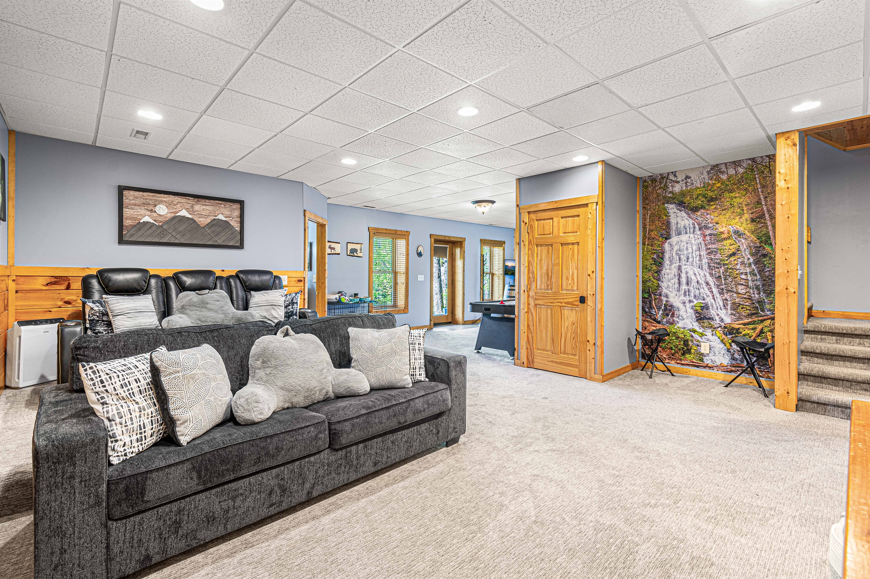 Spacious, comfortable, inviting = Ridge Top Adventure Cabin theater room!