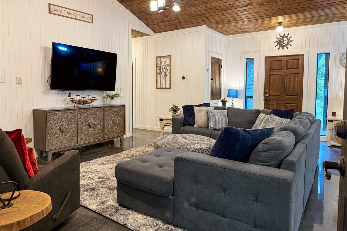 Comfy sectional with a full-size pull-out for one guest.