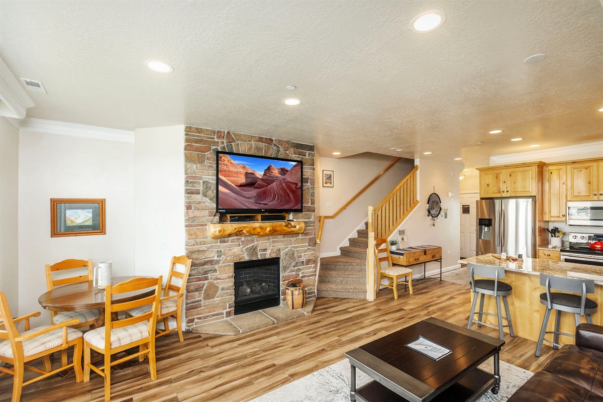 Cozy up by the gas fireplace and enjoy movie nights or quiet evenings in this warm and inviting living room.