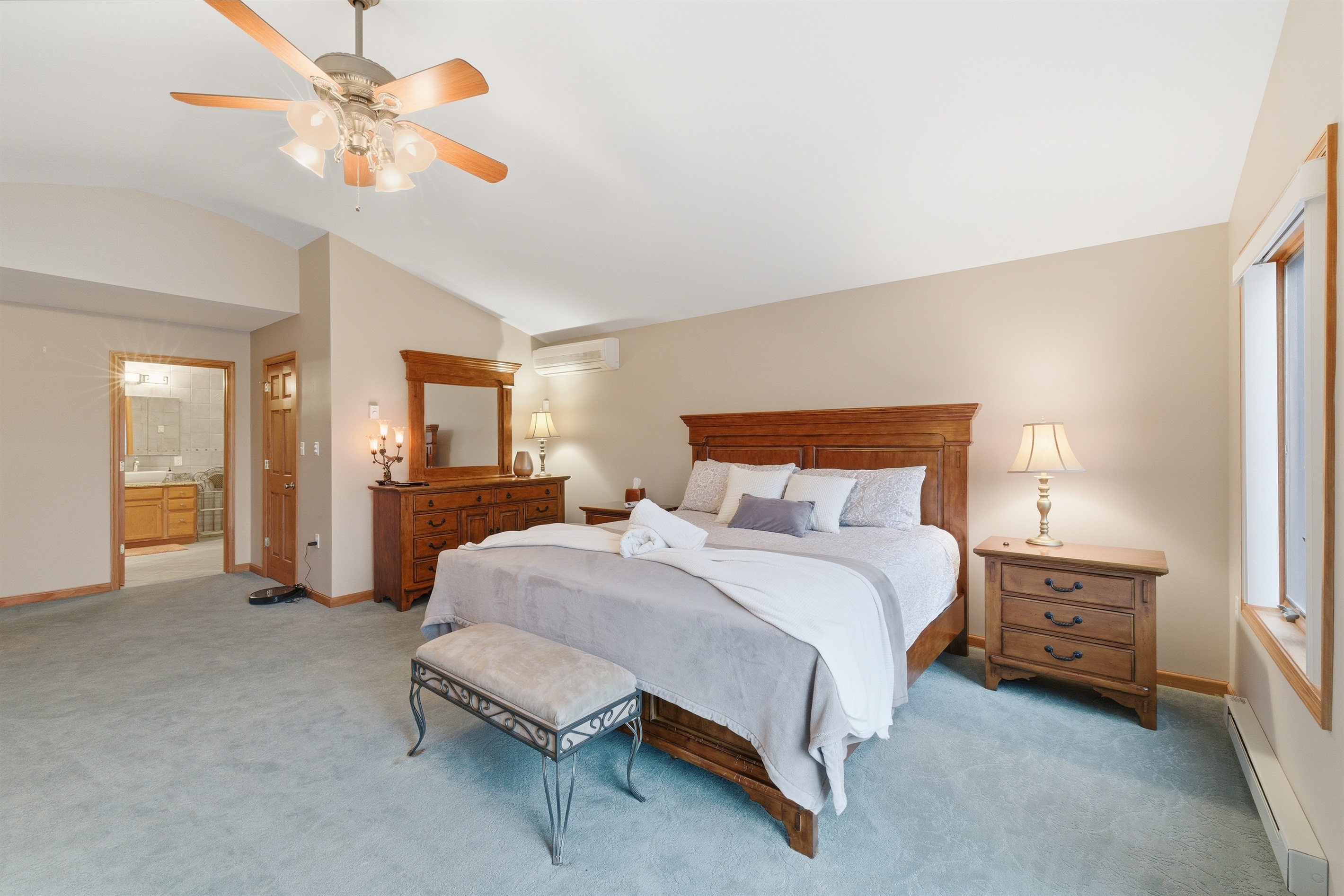 Master Bedroom with King size bed, fireplace, Roku TV and en-suite bathroom