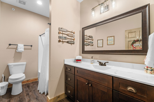 Full bathroom on main level. Open to all, but perfect for bunk room right across the hall.