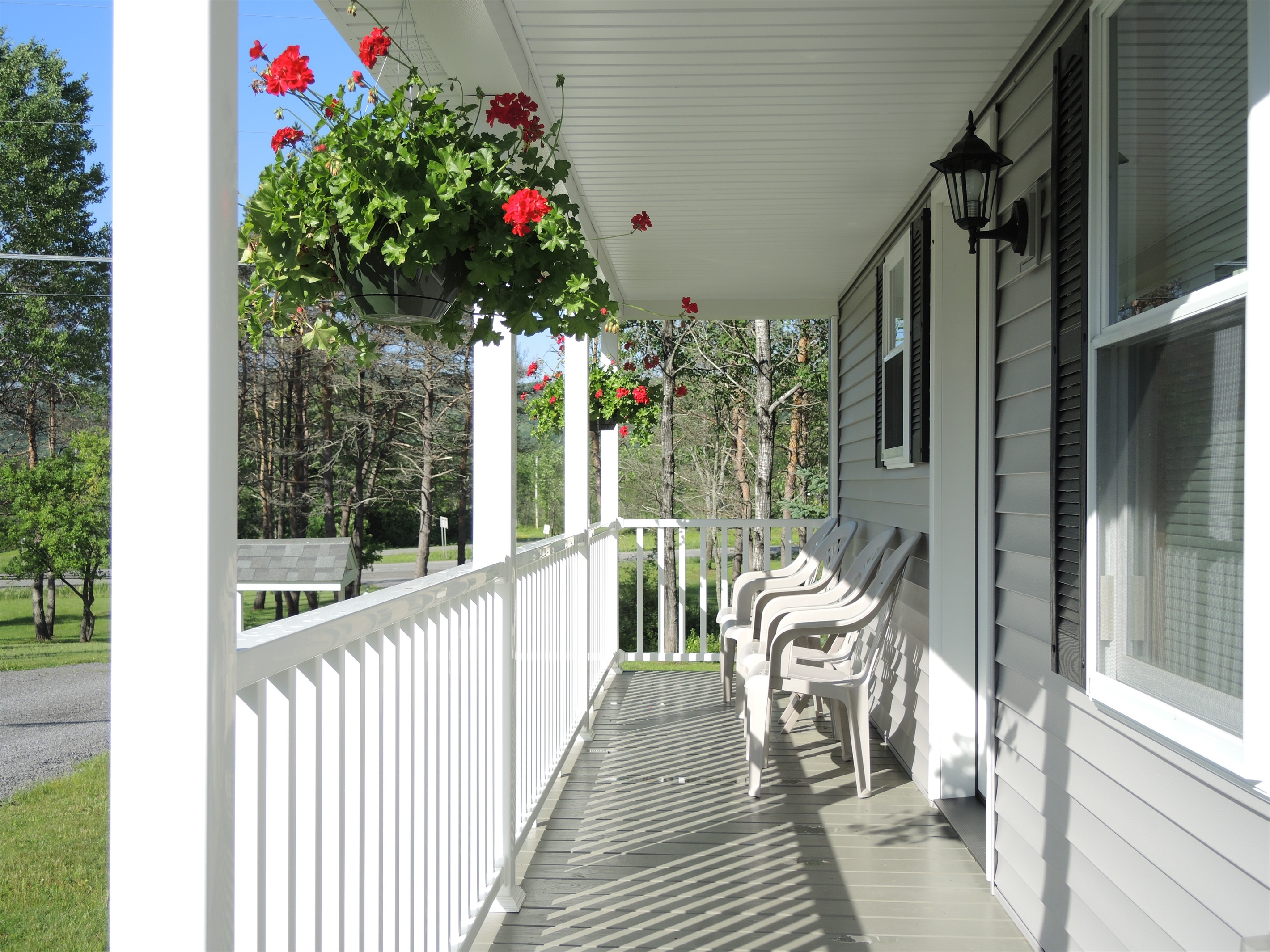 Private covered front porches on each unit