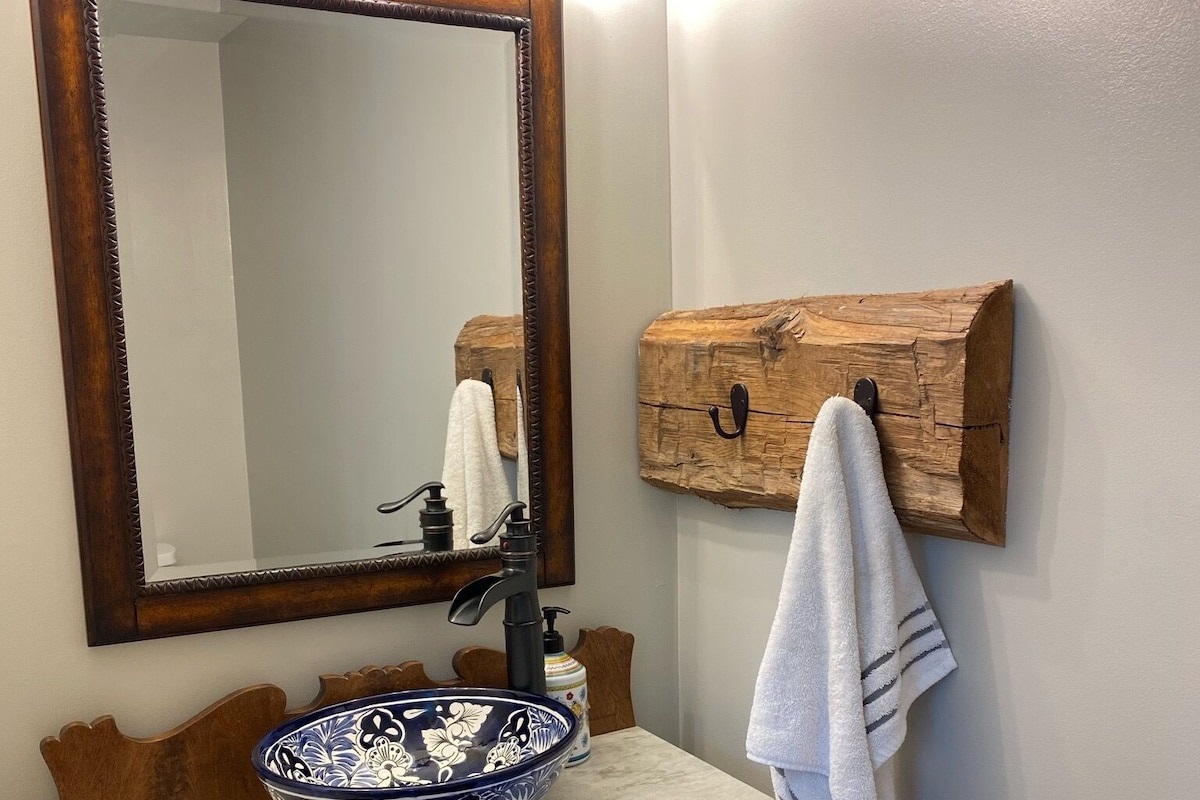 Half bath, talavera sink and antique dresser reconverted as vanity