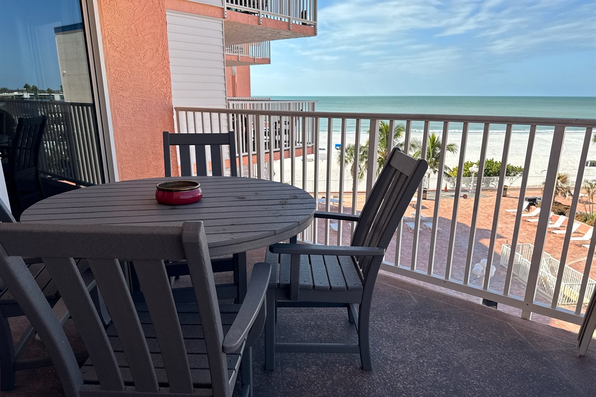 The unit's private balcony overlooks the beach and pool!