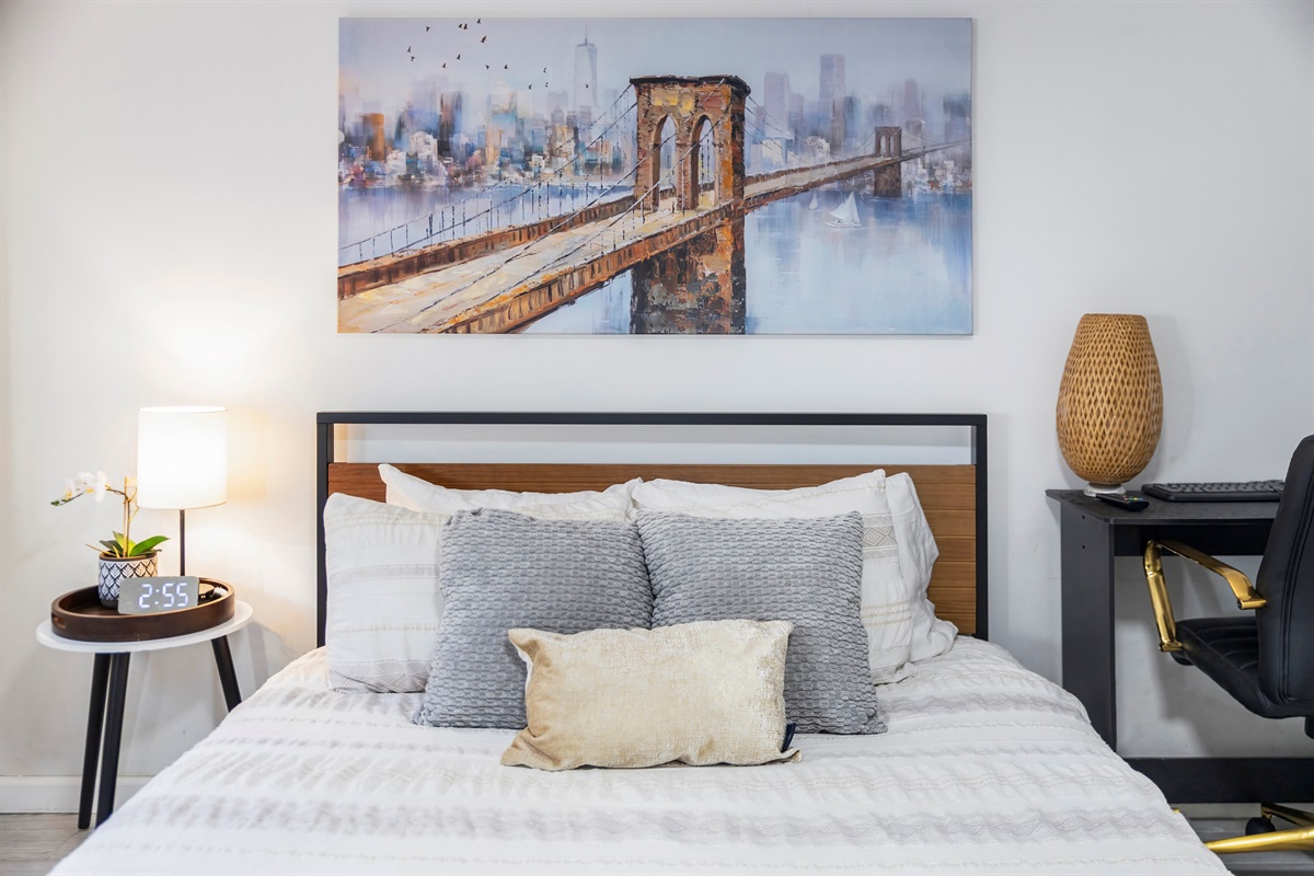 Crawl into plush bedding and drift off quickly in a calm bedroom designed for deep, restorative sleep.