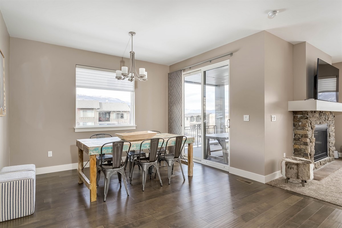 Dining area filled with natural light and scenic surroundings