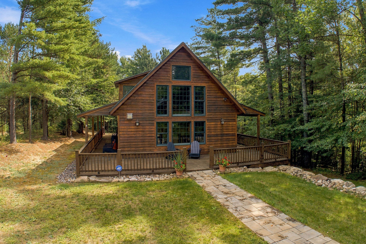 Follow the stone walkway to your private Adirondack retreat.