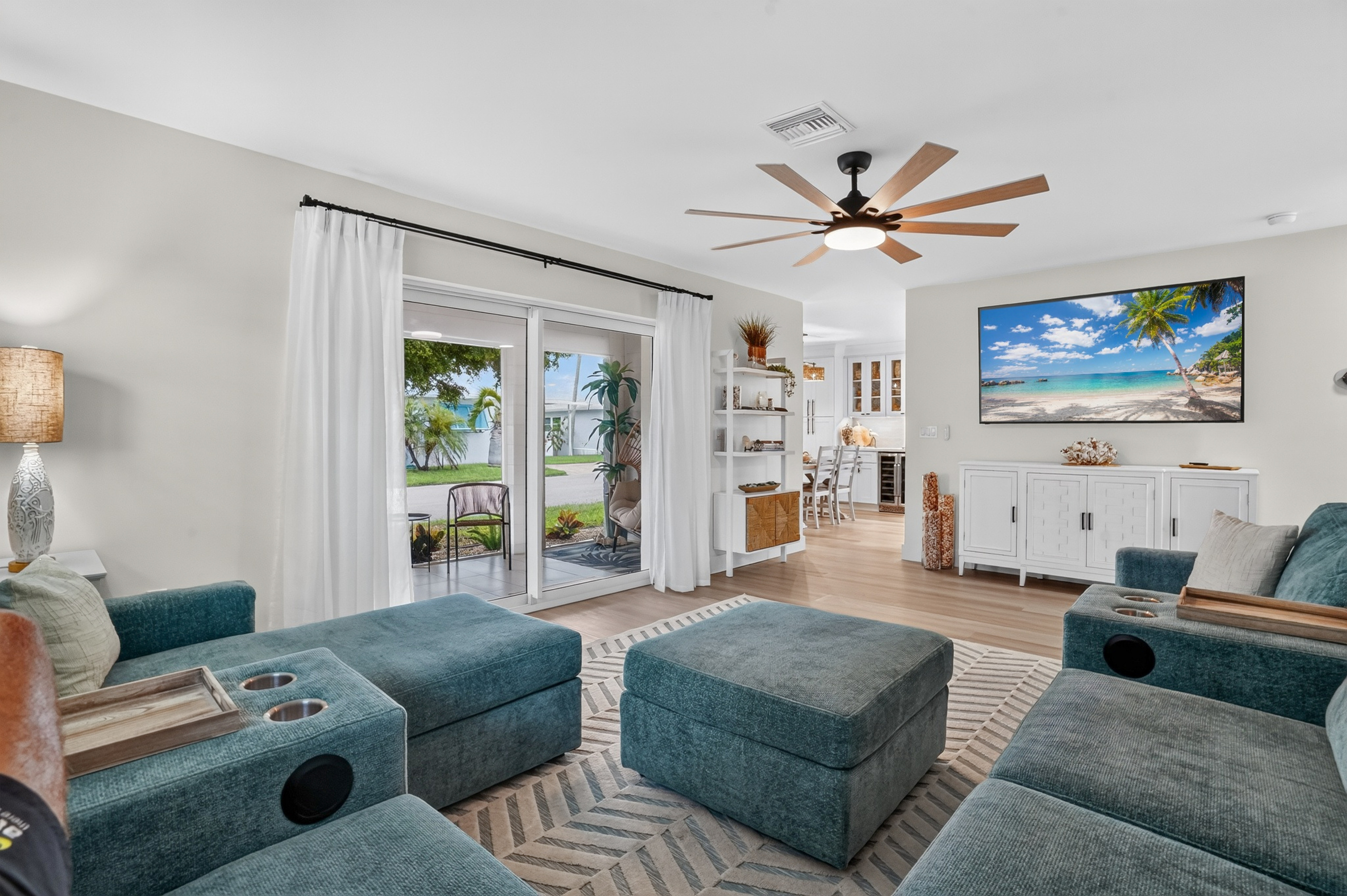 Enjoy movie night on the 75-inch smart TV or open the sliding doors to the lanai.
