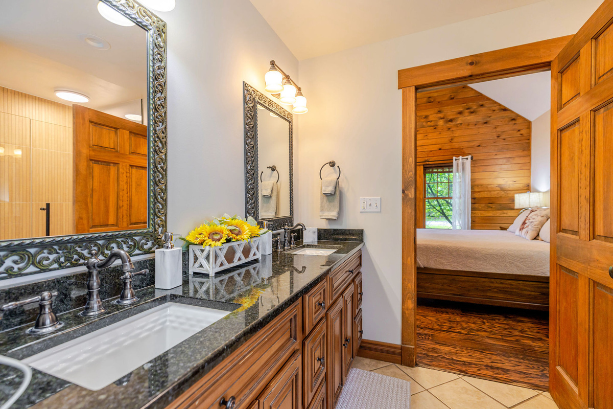 The primary ensuite offers both comfort and convenience with a soaking tub and separate shower.