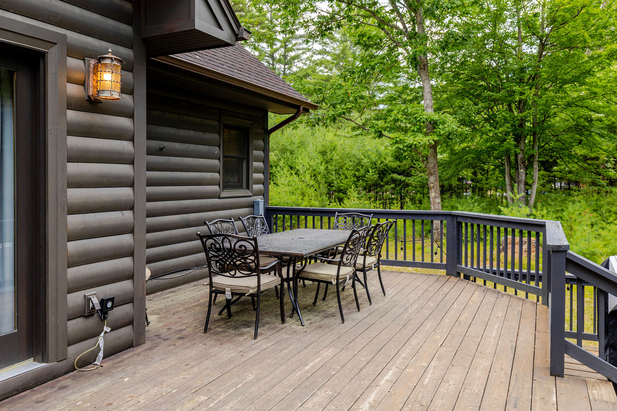 Gather around the outdoor dining table and enjoy meals surrounded by the beauty and tranquility of the Adirondack forest.