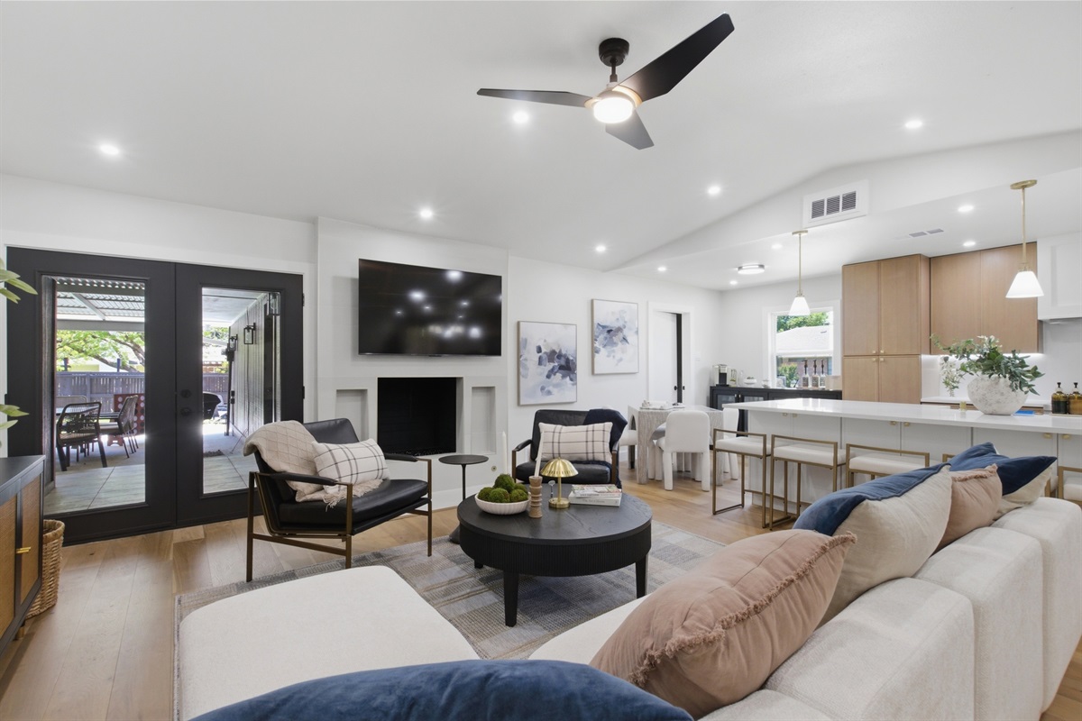 Smart TV with Roku above the Gas Fireplace anchors the living room. Pull up the sectional and settle in for cozy Frisco movie nights.