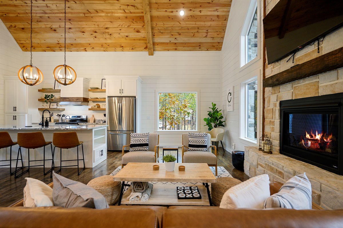 The heart of the cabin, where comfort and connection come naturally. 
From movie nights on the couch to quiet mornings by the fire, this space was designed for slowing down beautifully.