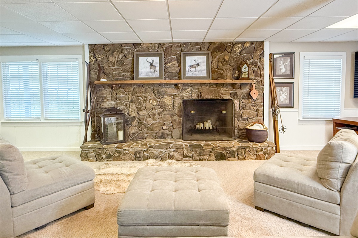 The basement also includes a wood-burning fireplace to adds to its cozy charm.