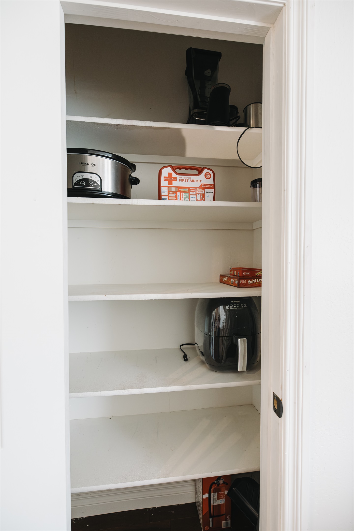 Fully stocked kitchen pantry with convenient appliances including air fryer, slow cooker, coffee maker, and essentials—perfect for easy meals and relaxed mountain stays at Attiwood Ridge.