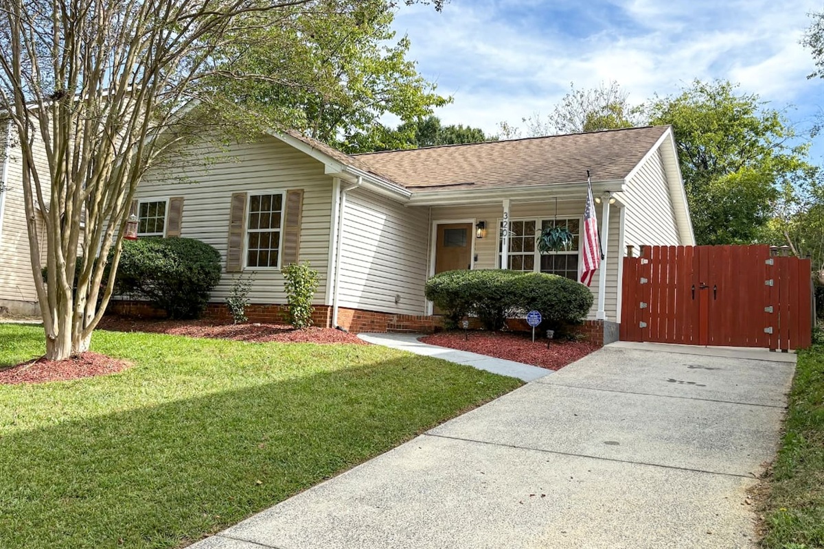 Front of The Reid Cottage - A ranch-style home with private fenced-in backyard!