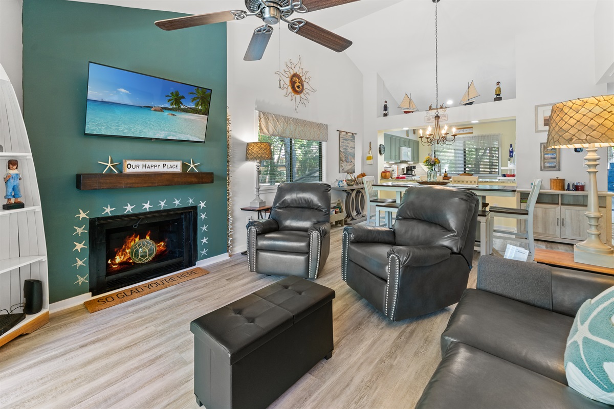 Large open Living room with large TV and patio access