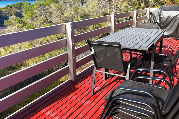 The outdoor dining area on the upstairs balcony at Carlenes Getaway gives you seating for six, an extendable table and a relaxed Lake Victoria outlook.
