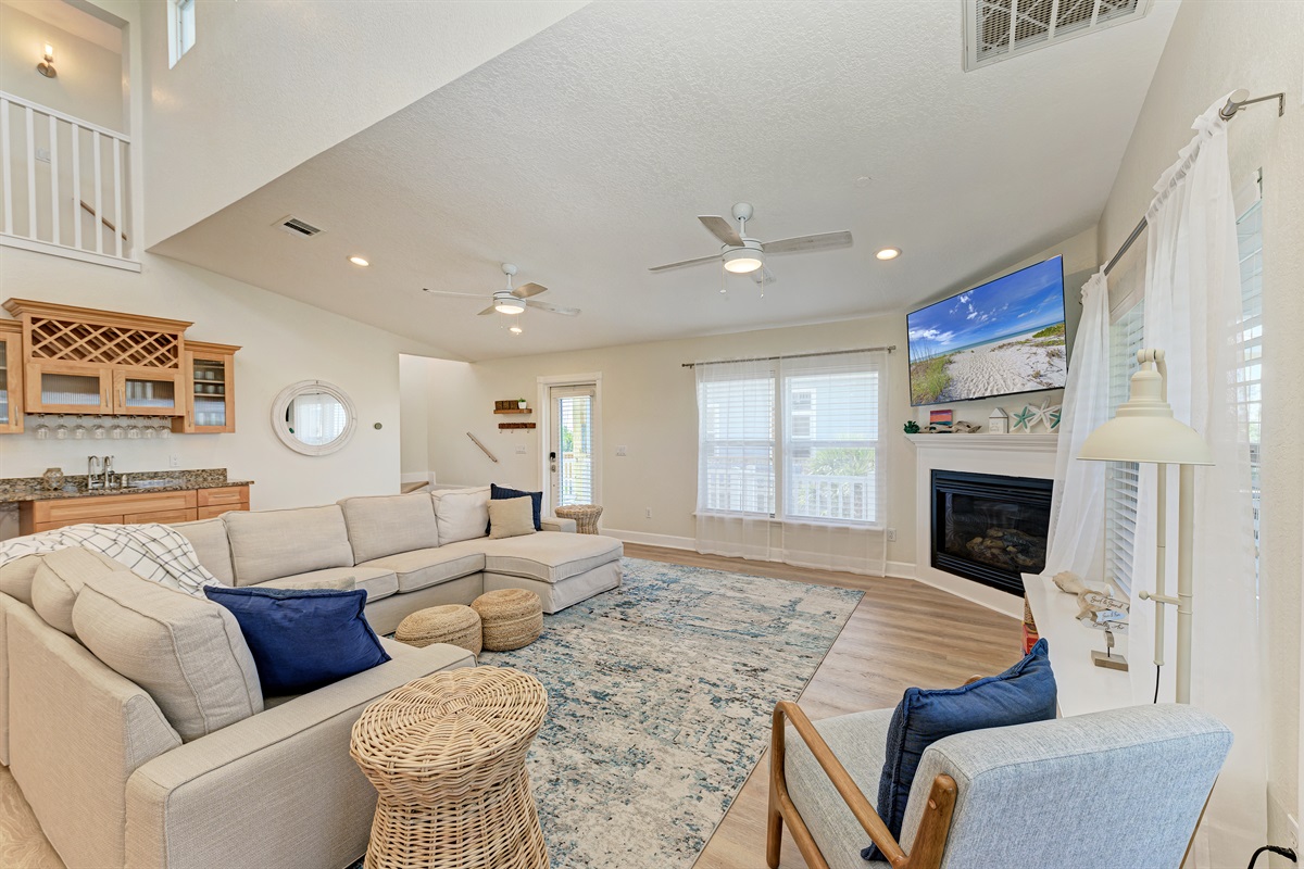 Enjoy the spacious and open concept living room on the new, plush sectional for a movie with the family or read a book in the morning.