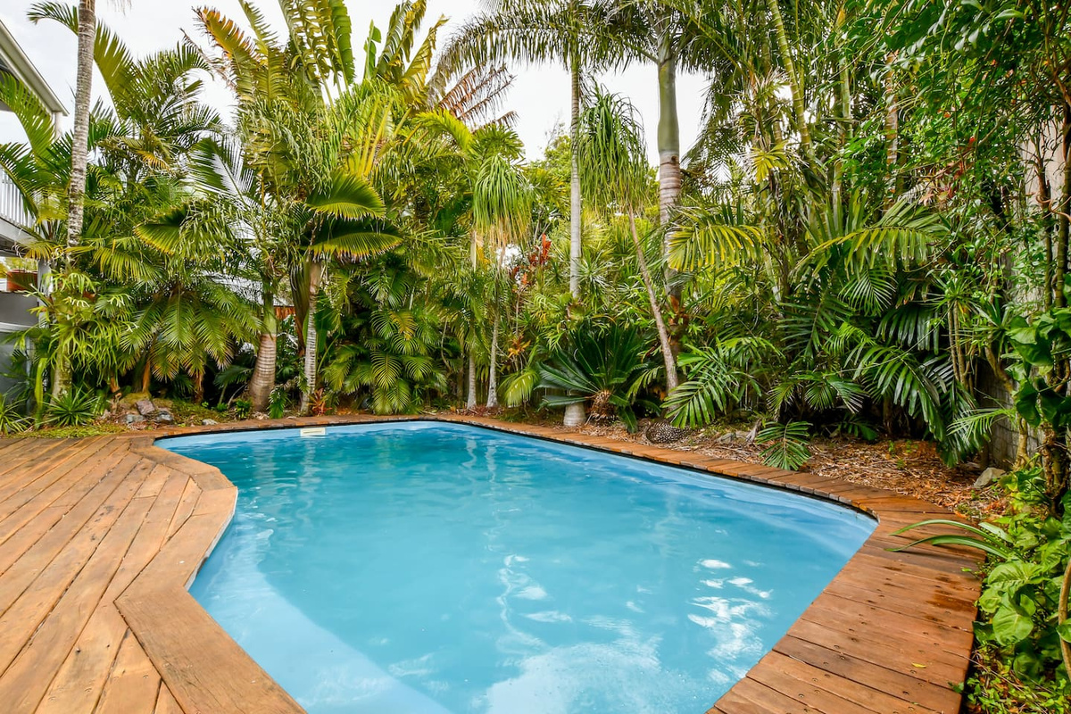Aaron's Beachside Boat House brings a tropical resort feel to Marcoola, with a private pool surrounded by lush greenery on Queensland’s Sunshine Coast.