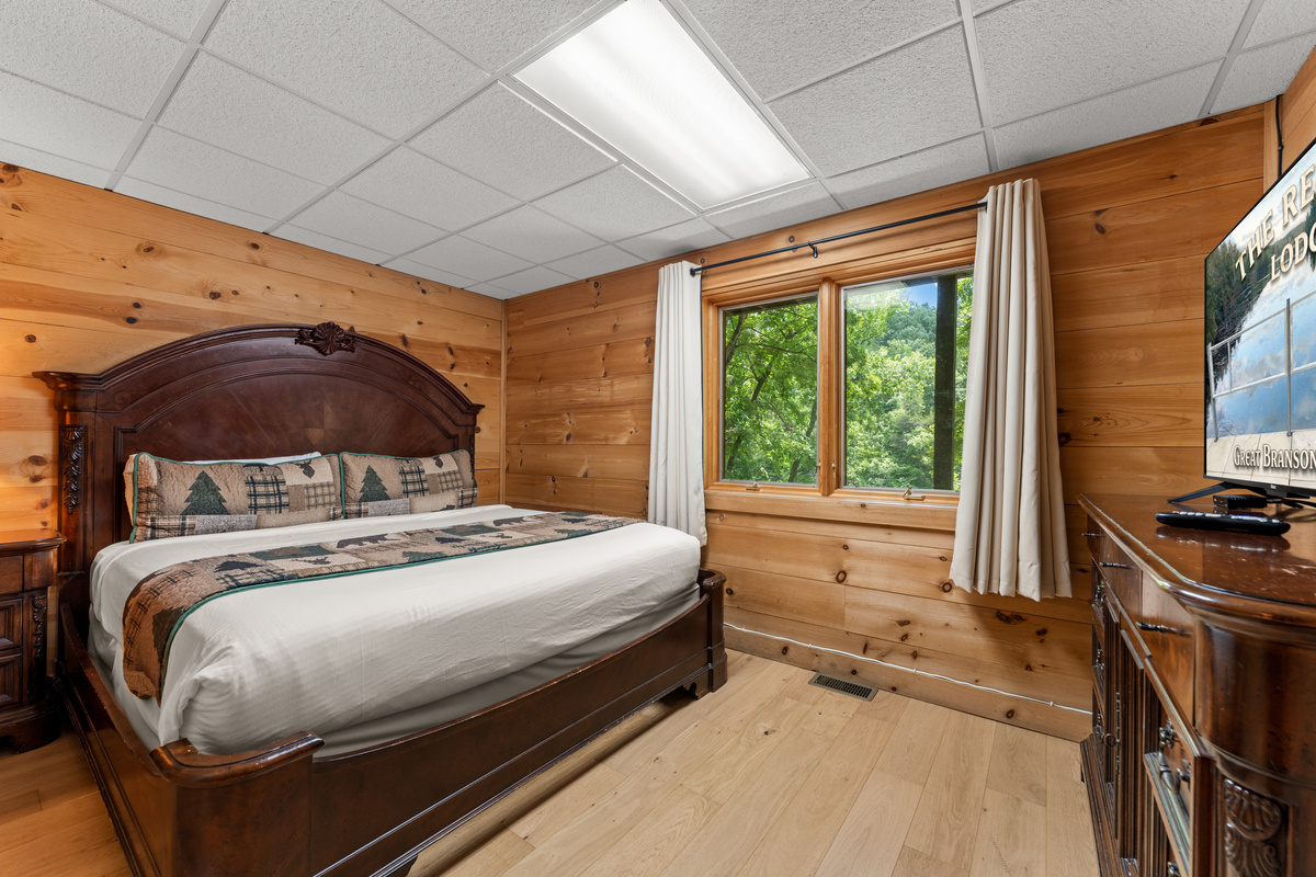 Bedroom #5 has a king size bed and 50" smart TV with cable.