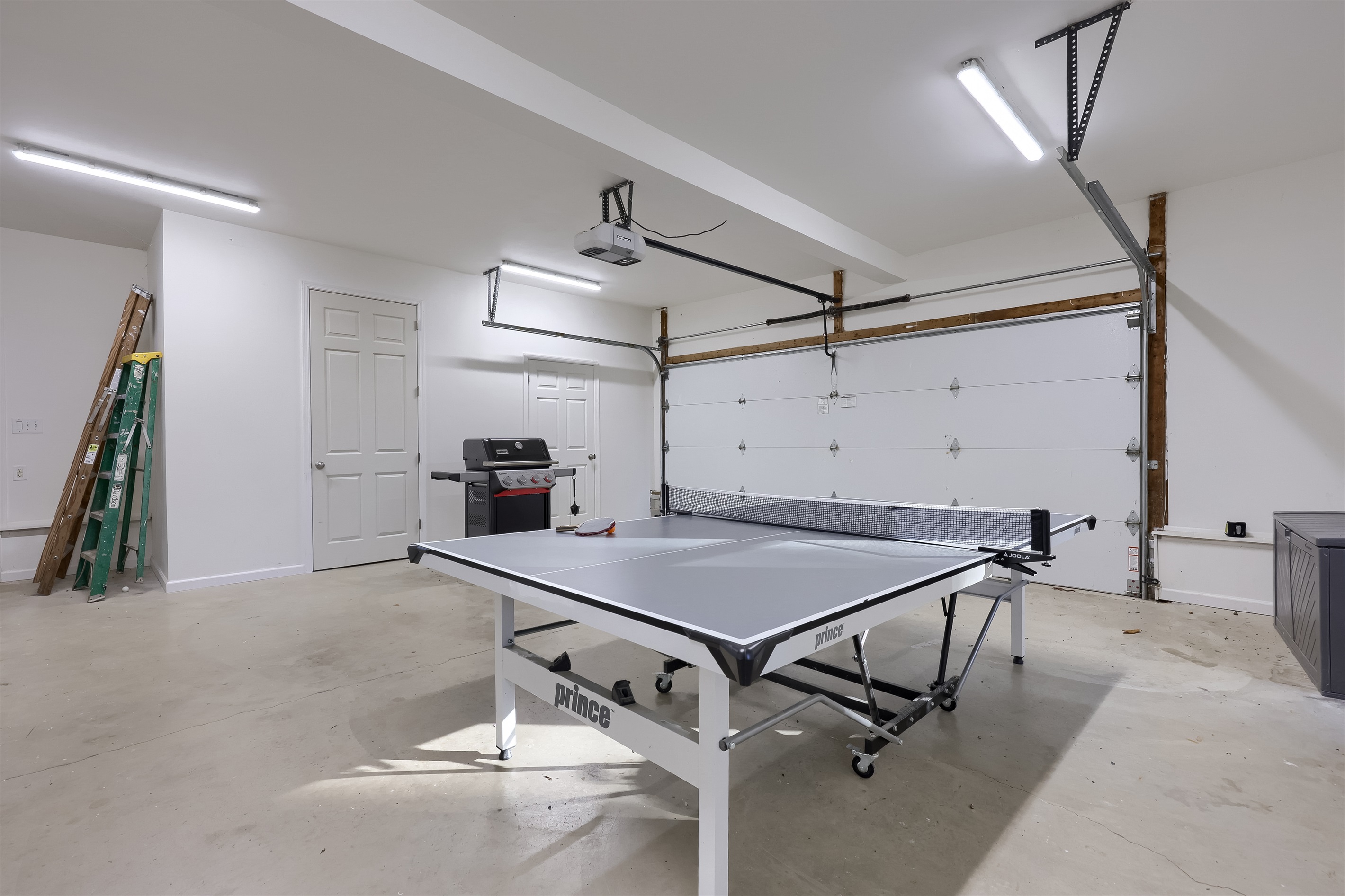 2 car garage with Ping Pong Table