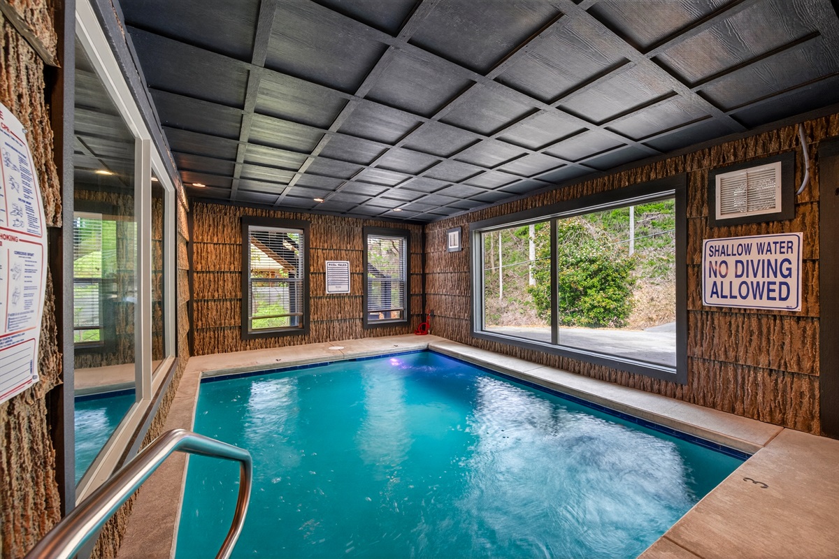 Indoor swimming pool. Self-locking safety doors and alarms.