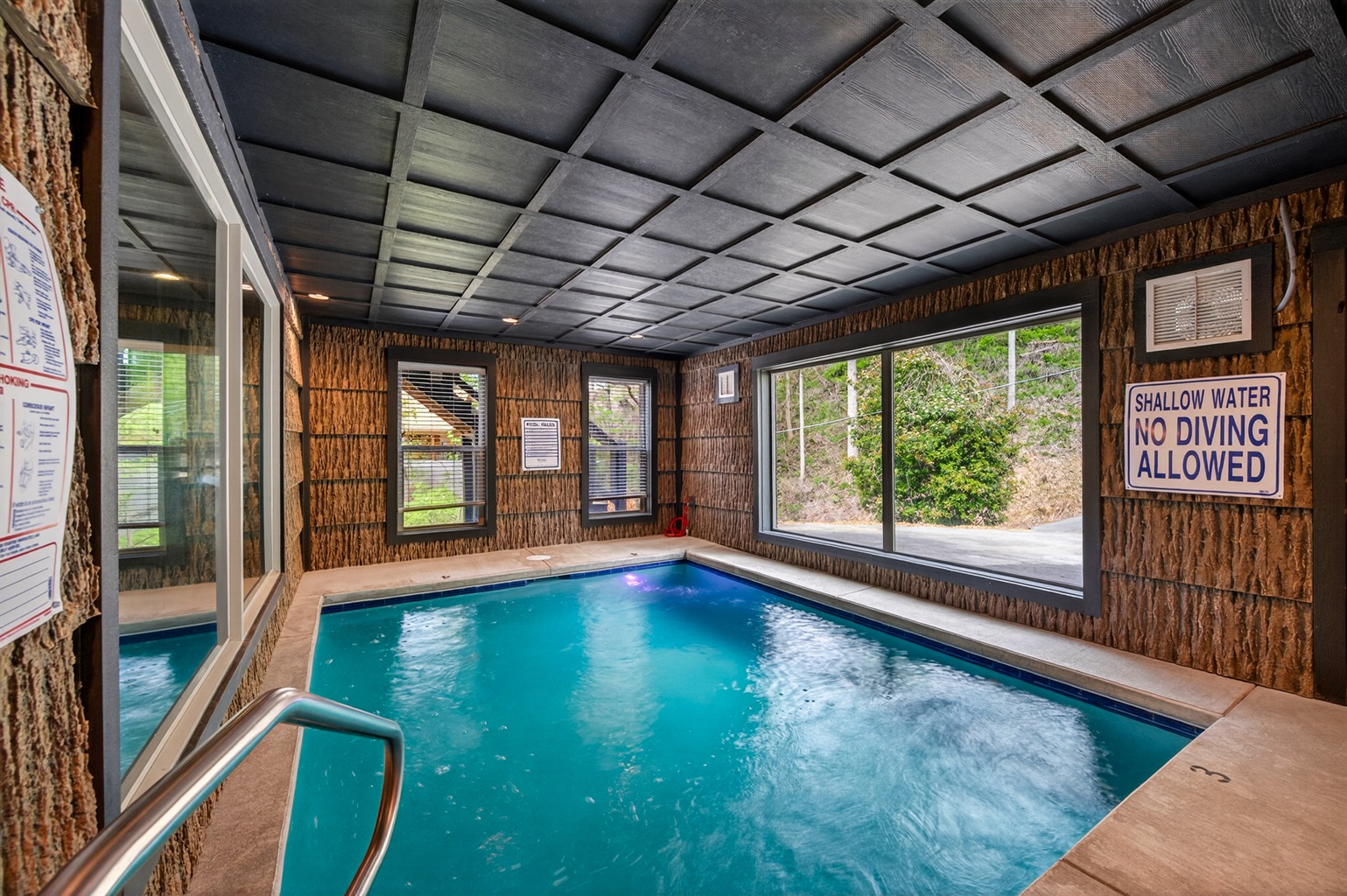 Indoor swimming pool. Self-locking safety doors and alarms.