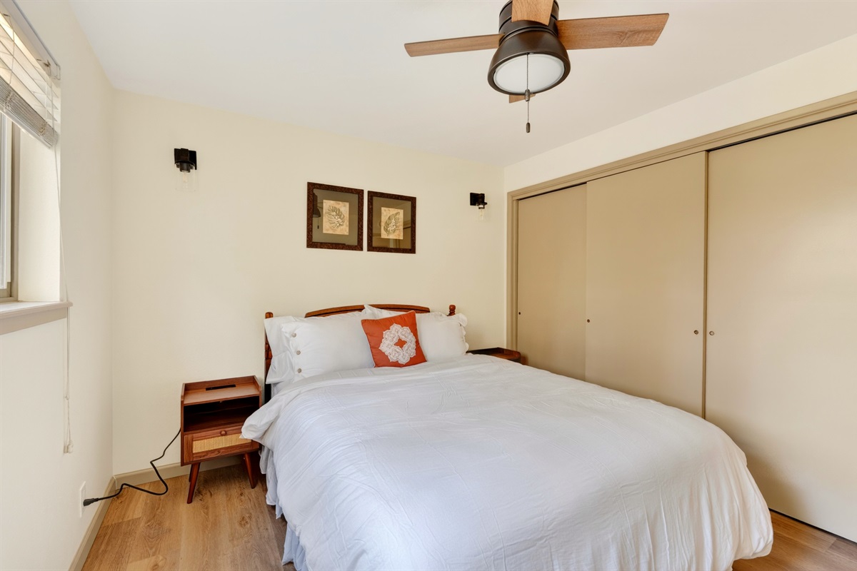 Bedroom 3 features a comfortable queen bed, Smart TV, and a convenient in-room sink, offering added flexibility and comfort for guests.
